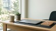 © Devilian - Minimal Workspace with Laptop, Coffee and Notebook