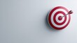 © Chandlerlikes - Archery target with a single arrow in the bullseye, minimalist white background, precision and success