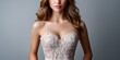 © NovaVision - Elegant bride in a detailed strapless wedding gown with intricate lace and beadwork