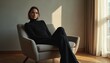 © Viktor - Woman in black turtleneck sits in armchair near window. Natural light creates soft shadows on wall and floor. Minimalist indoor portrait with elegant mood. Casual yet sophisticated style.