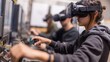 © Justlight - Students engaged in VR headsets simulating technical machinery operation in a training room highlighting focused hands interacting with controls while the background stays blurred.
