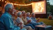 © Viktor - Elderly friends enjoy outdoor movie on grass. String lights glow warm on happy senior group watching film. People laugh, drink wine, relax together at twilight cinema.