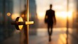© Busayo - Silhouette of Man Walking Out of Office Door at Sunset