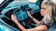© Rendara Studio - Focused driver navigating route with connected vehicle data network