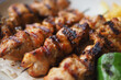 © Towfiqu Barbhuiya  - Grilled chicken kebabs served on a plate with vegetables