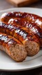 © Uliana - Grilled Smoked Sausage with Herbs and Cherry Tomatoes