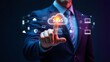 © Raj - Businessman interacting with saas cloud computing concept surrounded by digital icons and light