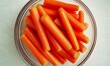 © Dan's World - Orange carrot slices in glass bowl