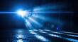 © bejopayon - Bright blue light beams shining down.