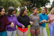 © Sabrina - Happy multi generational women circle doing yoga meditation retreat outdoor - Mindfulness, multiracial people with different body and age concept
