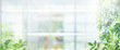 © hakinmhan - Big window glass building with blur greenery