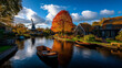 © Nan - AI generator images of  cultural conservation area featuring historic windmills, traditional wooden houses, and craft workshops. It's especially beautiful in the autumn when the leaves change color.