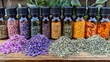 © NURUL - Assortment of Dried Herbs and Essential Oils for Natural Remedies and Aromatherapy.