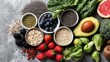 © AlirezA - Fresh fruits and vegetables arranged on a table with seeds and grains for healthy eating