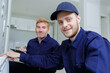 © auremar - happy male plumber working with teacher