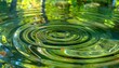 © zainal - A serene pond water ripple occurs near firefly with lush green surroundings
