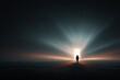 © woters - A lone figure stands in front of a bright doorway with rays of light.