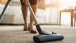 © Vitalii - Housekeeping service cleaning hotel room carpet with vacuum, hygiene and maintenance concept