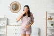 © Pixel-Shot - Young pregnant woman suffering from toxicosis in bathroom