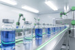 © Meow Creations - Glass vials with blue liquid moving on automated conveyor belt in pharmaceutical factory