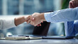 © wedmoments.stock - Business people shaking hands in modern office. Partnership and agreement concept.