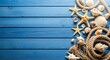 © ruzina - Starfish and seashells on blue wooden planks with ropes  beach theme
