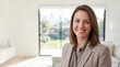 © Artem Zatsepilin - portrait of confident mature caucasian businesswoman smiling at camera. successful female executive in modern office or home interior. corporate leadership. web banner with copyspace.