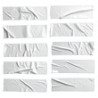 © Yusril - Wrinkled strips of matte white adhesive tape, isolated on black