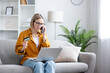 © Liubomir - Woman experiencing fraud during online shopping banking issue