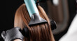 © Parilov - Keratin treatment process highlighting hair care with blow dryer and brush