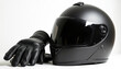 © Vadym - Black motorcycle helmet and leather gloves. Essential biker gear for safety and style. Protective equipment for riders on road trips and adventures. Maximum comfort.