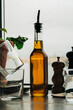 © Cavan - olive oil on a table in a restaurant surrounded by condiments