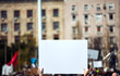 © astrosystem - Protesters holding placards and signs on the streets.