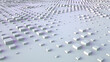 © Anatoly Stojko - Abstract background with 3d rendering with array cubes exchanging size. Random scale of elements with color reflections. Light corporate background.