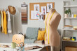 © Pixel-Shot - Interior of fashion designer's studio with workplace and mannequin