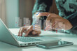 © iqbal - Recruiter reviewing online job applications. Concepts include digital transformation, remote hiring, automated recruitment, data-driven HR, workspace efficiency, and professional screening