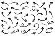 © Daishin - Hand Drawn swirl or twist curved arrows vector. Collection doodle marker arrows in different directions. Black hand drawn doodle arrows vector illustrator.