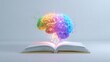 © AlirezA - Colorful brain appears above open book with sparks at a creative space