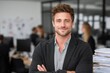 © Kessel - Businessman Portrait of a Handsome Young Professional Smiling Confidently in a Modern Office Representing Career Success and Leadership