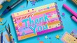 © Aiman Nabeel - Vibrant handmade thank you card decorated with colorful washi tape glittery stars and a hand lettered Thank You message The card is on a craft desk with tools like scissors and markers nearby