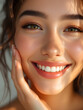 © Salman - Close up portrait of a young woman with a radiant smile touching her cheek in warm golden hour sunlight with soft focus