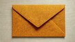 © MKS - An elegant orange envelope rests on a wooden table, displaying a minimalist design and classic stationery aesthetics ideal for many occasions