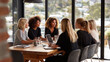 © Pranjul - Confident women leaders collaborating in a modern corporate office environment