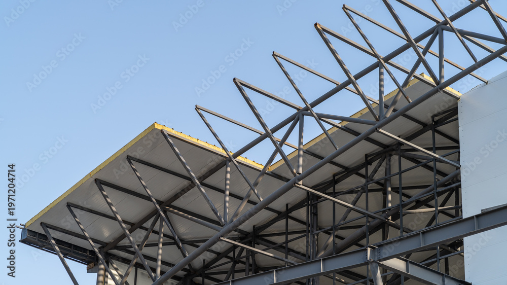 Curved steel spatial frame roof structure. Metal arched framework of a ...