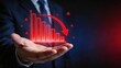 © Hao - Businessman hand holding glowing red hologram bar chart with downward arrow symbolizing financial crisis economic recession stock market crash corporate loss negative growth