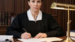 © Guilherme - Serious female judge sitting at courtroom desk working