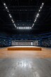 © Andrii Zastrozhnov - Boxing ring on wooden floor with blue ropes and bright overhead lights, arena seating surrounding the elevated canvas stage ready for a fight night event