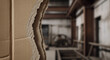 © Alif - Close-Up Torn Cardboard Layers Against Blurred Industrial Warehouse Interior Showing Texture And Decay