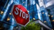 © EndlessVFX - Close-up of stop sign in front of modern city building