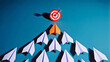 © MdIbrahim - Innovative business strategy with a leading arrow-shaped paper plane aiming for a target, symbolizing success and ambition